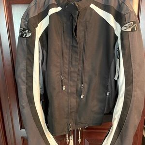 Armored motorcycle jacket. New with tags